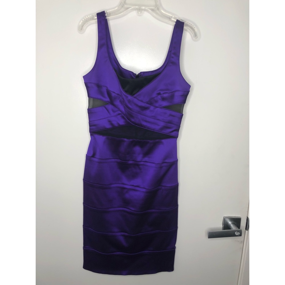 Purple satin dress with mesh cutouts